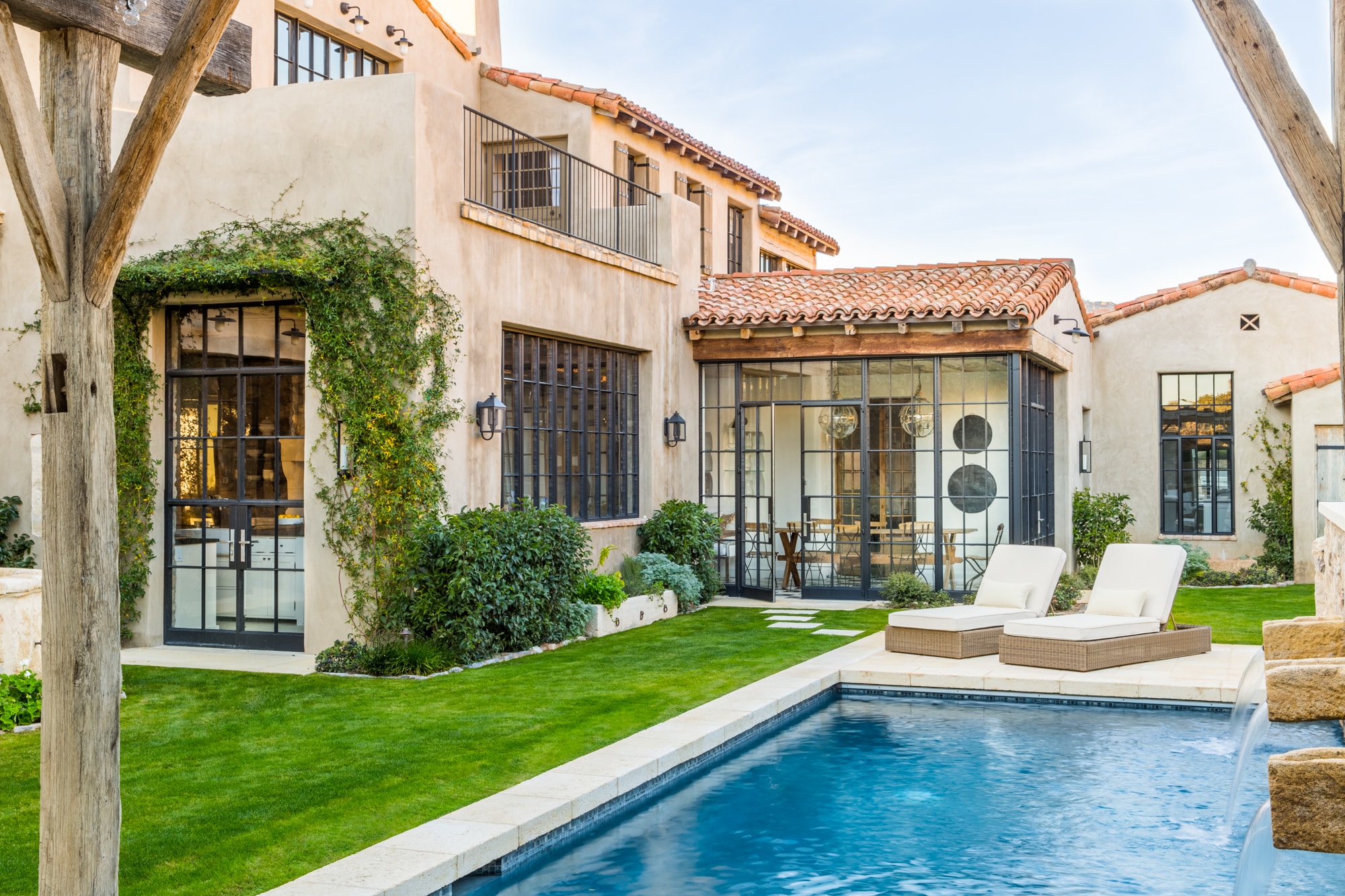 Member property — desert contemporary great room at twilight